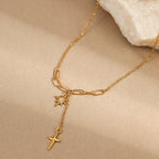 Gold star pendant necklace with delicate chain, perfect for everyday wear or gifting